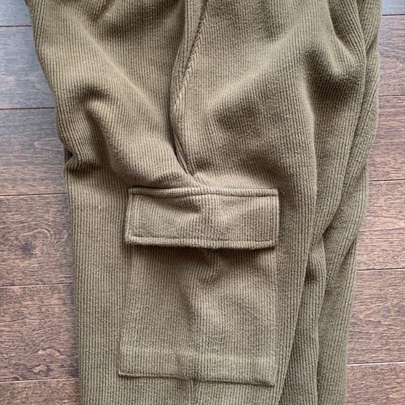 Olive green elastic waist pants with cargo style pocket on right leg - Picture 2 of 5